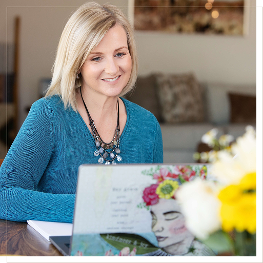 Beth Carroll on a computer